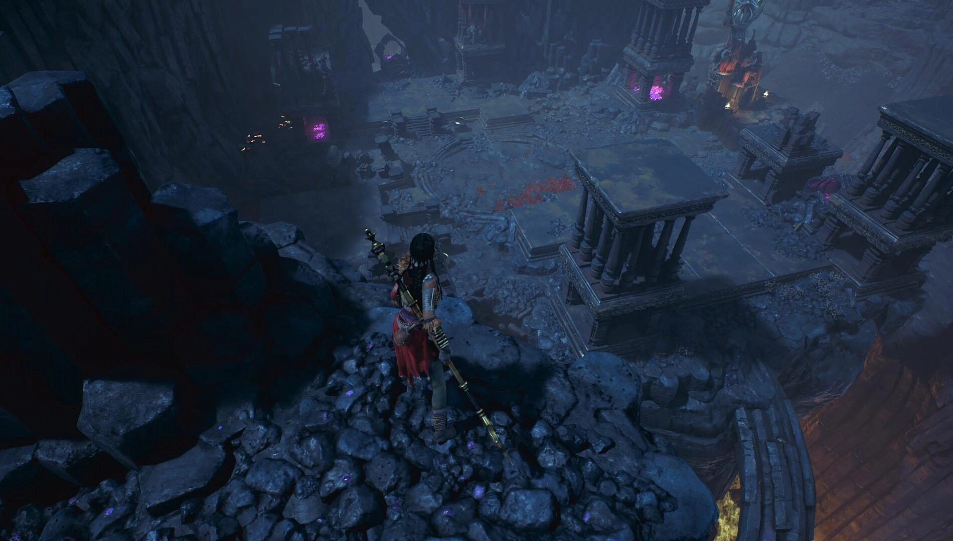 A character stands on rocky terrain, overlooking an ancient, mystical environment in