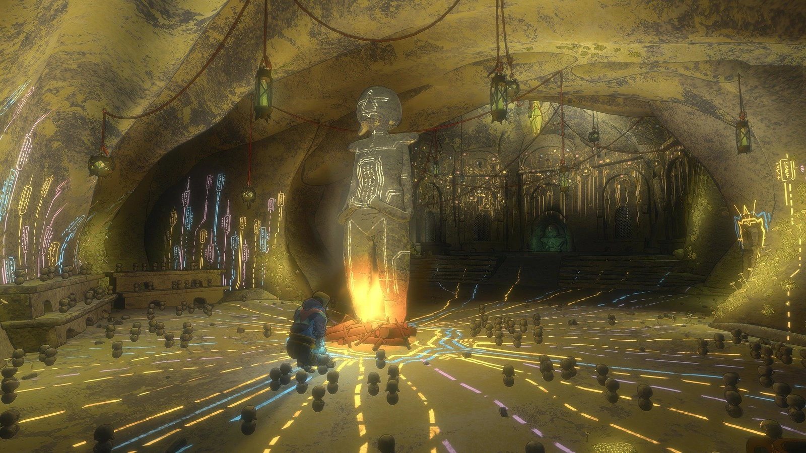 Statue in a cave with glowing lights; a climber interacts with an altar, hinting at deeper exploration in the game Cairn.