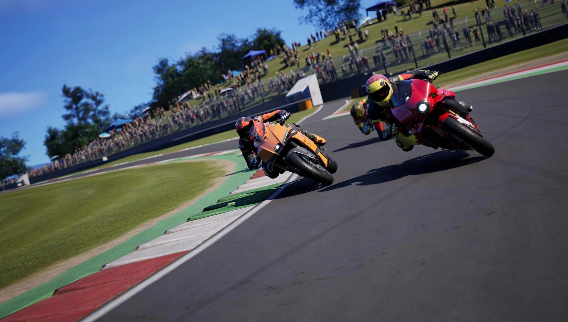 Two motorcycles leaning into a turn on a racetrack, showcasing realistic detail and dynamic action from Ride 6.