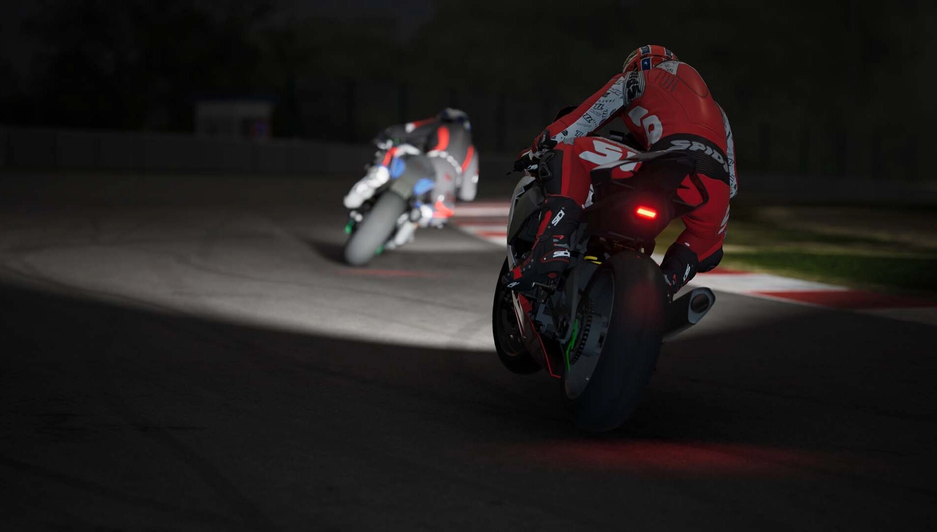 A thrilling night race scene from Ride 6, showcasing two highly detailed bikes on a racetrack. Experience ultimate realism!