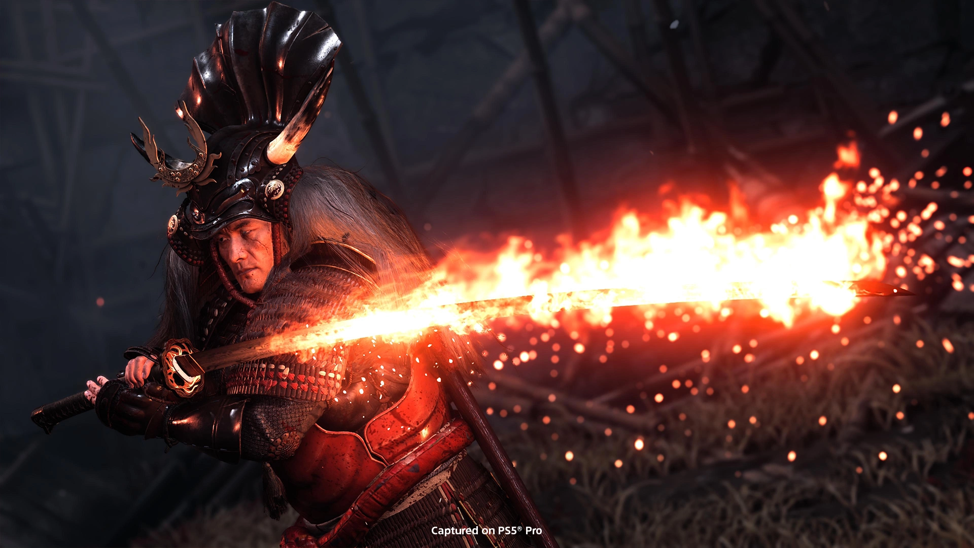 Epic duel scene from Ghost of Yōtei, featuring a samurai wielding a flaming sword in a dramatic battle setting.