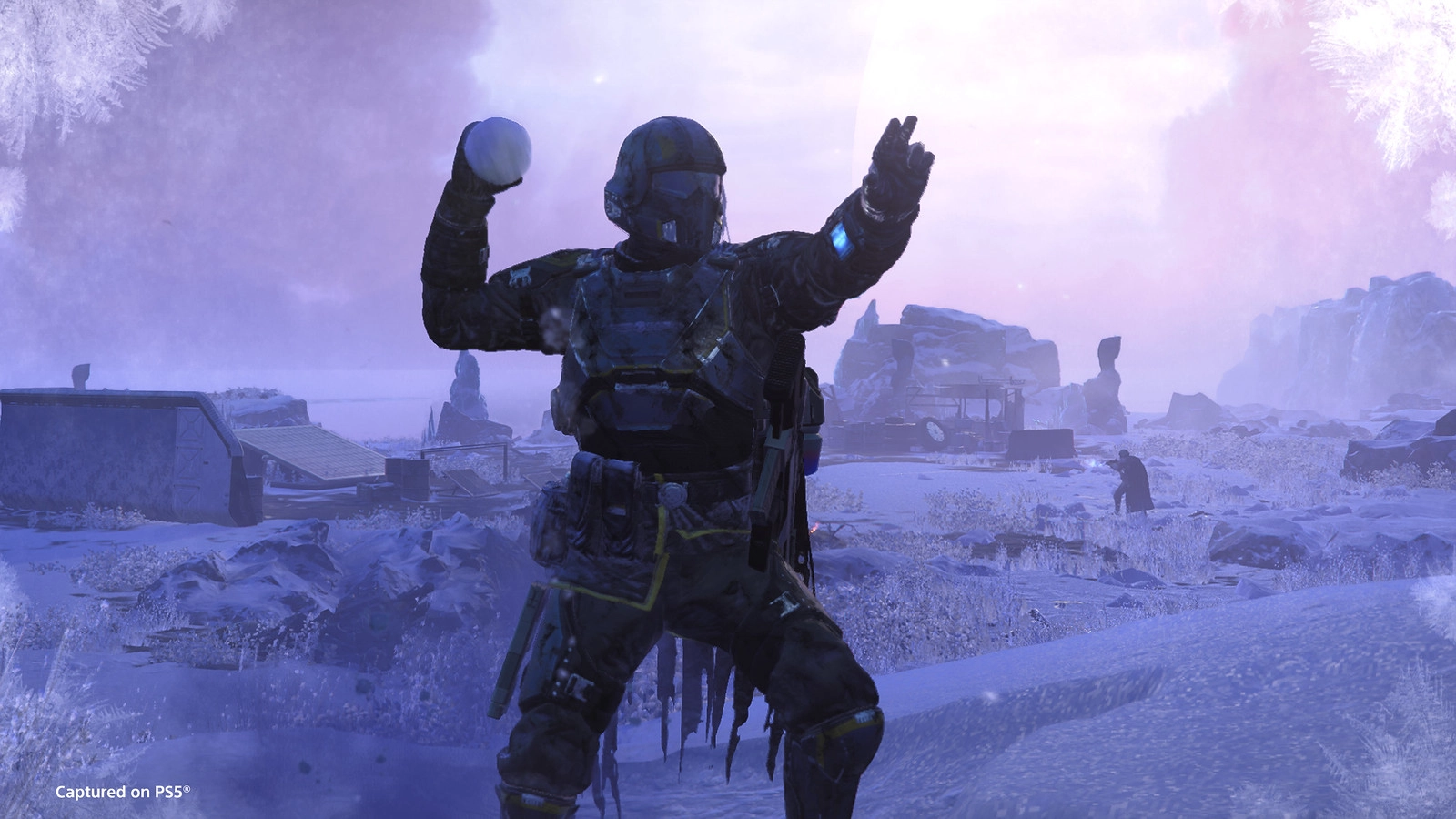 Helldivers soldier celebrating the Festival of Reckoning, ready to throw a snowball in a frosty, alien landscape.