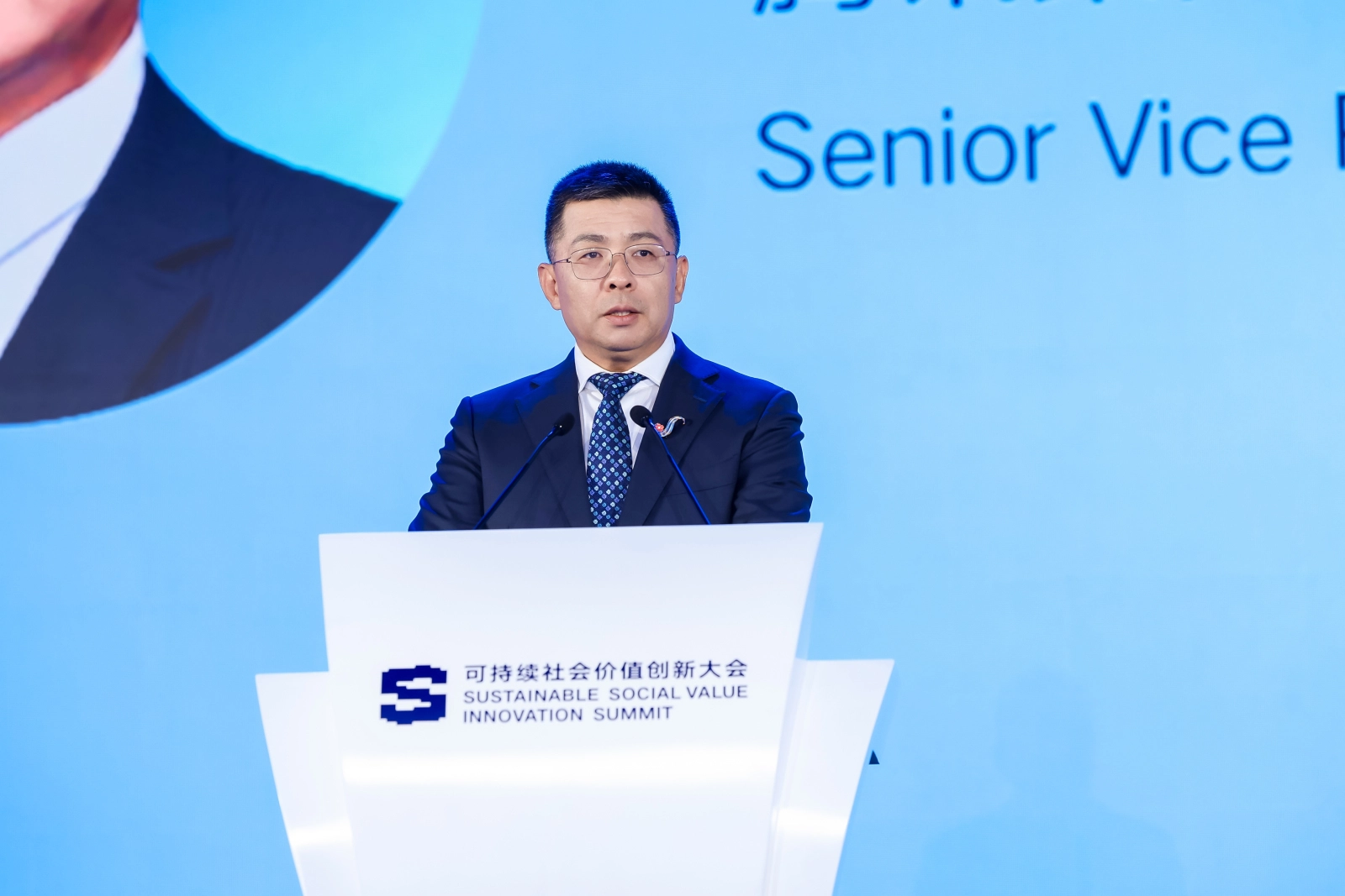 Dan Xi, Tencent SVP, speaks at the Sustainable Social Value Innovation Summit on AI