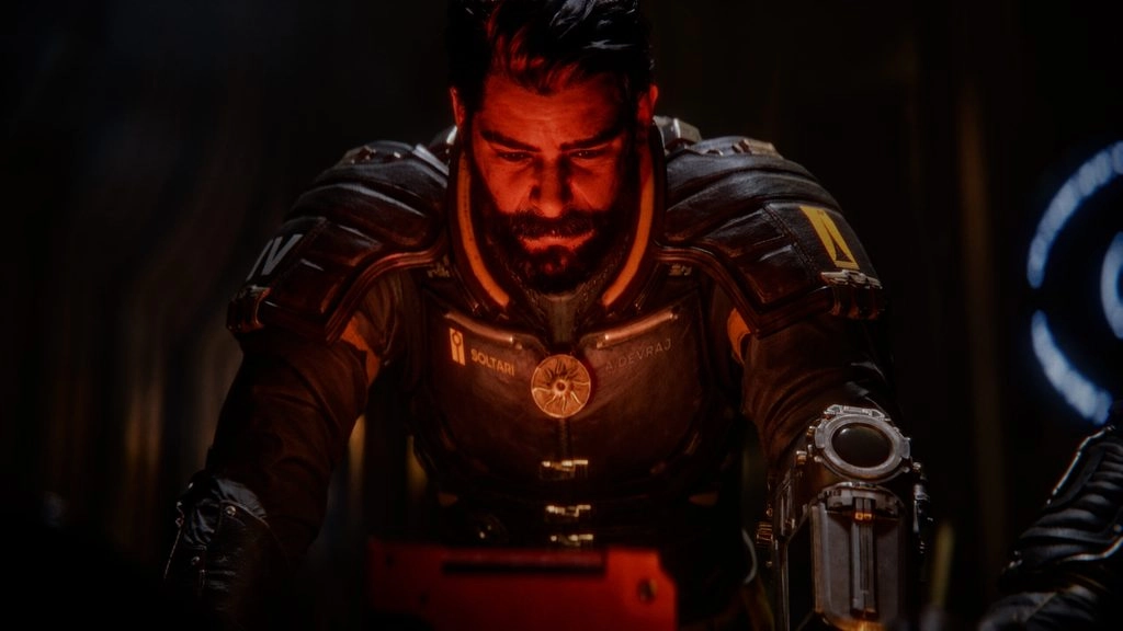 A focused character in a sci-fi setting, embodying mystery and action in Saros for PlayStation 5, featuring Rahul Kohli.