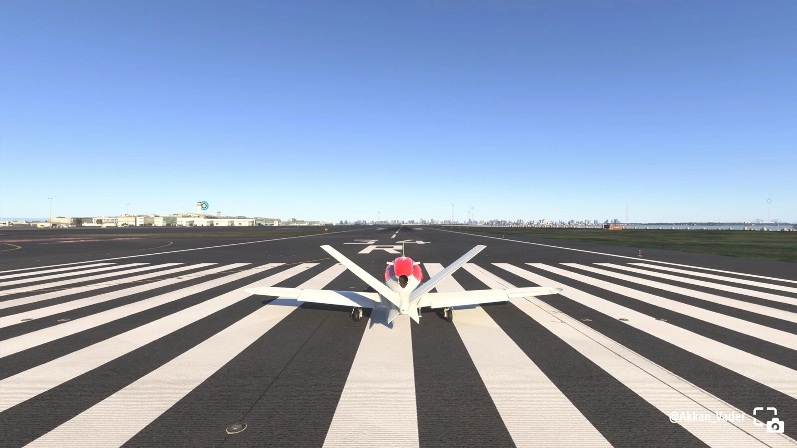 Plane on the runway ready for takeoff in Microsoft Flight Simulator, showcasing realistic airport scenery. #PSshare #PSBlog
