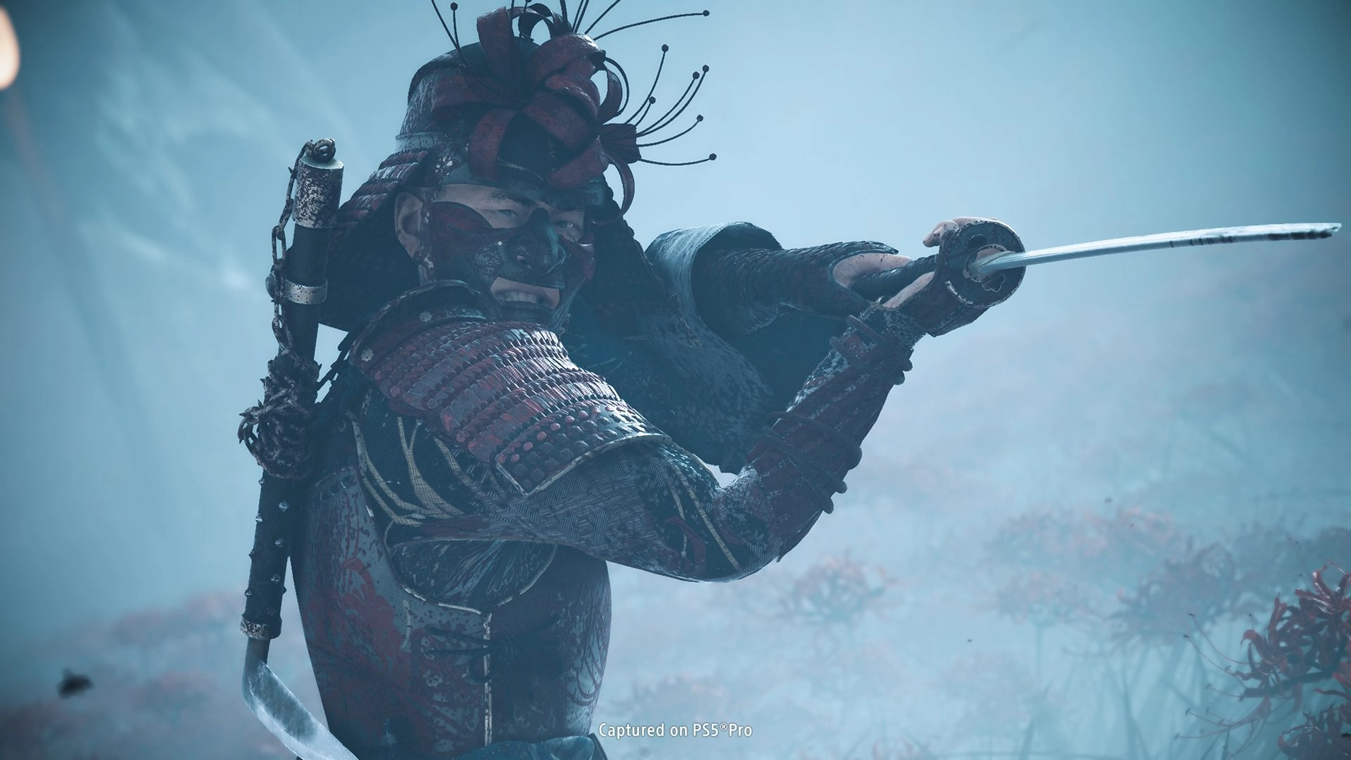 A menacing warrior in traditional armor brandishes a sword, setting the stage for a haunting adventure in Ghost of Yōtei.