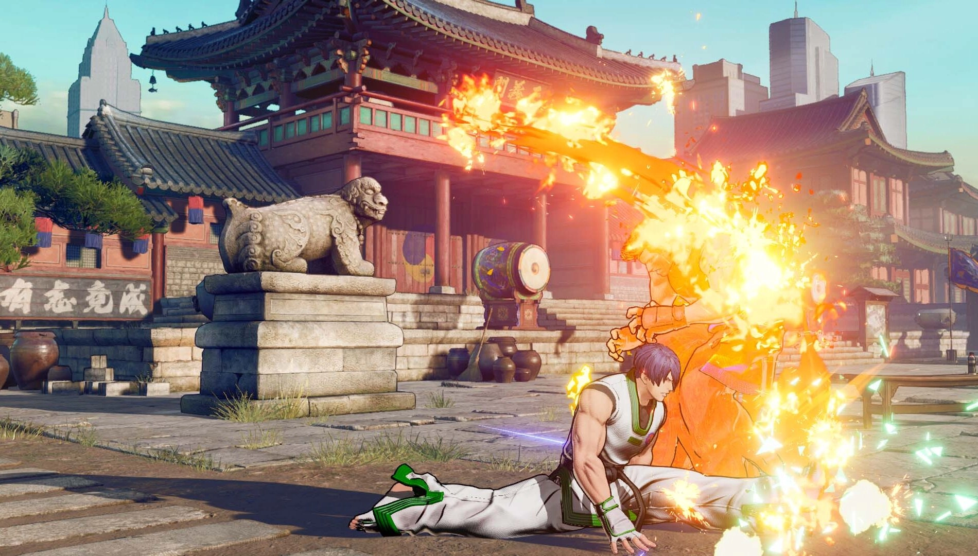 Kim Jae Hoon executing a fiery attack in a traditional courtyard, showcasing his powerful fighting skills