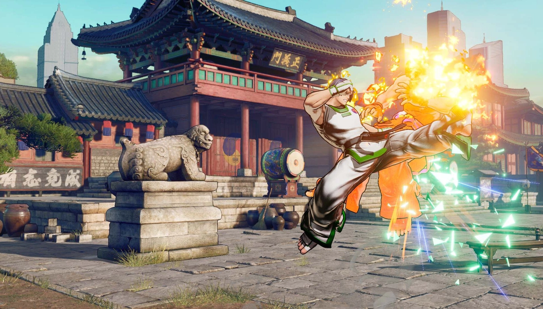Kim Jae Hoon performs a fiery kick in a traditional courtyard, showcasing his dynamic fighting style
