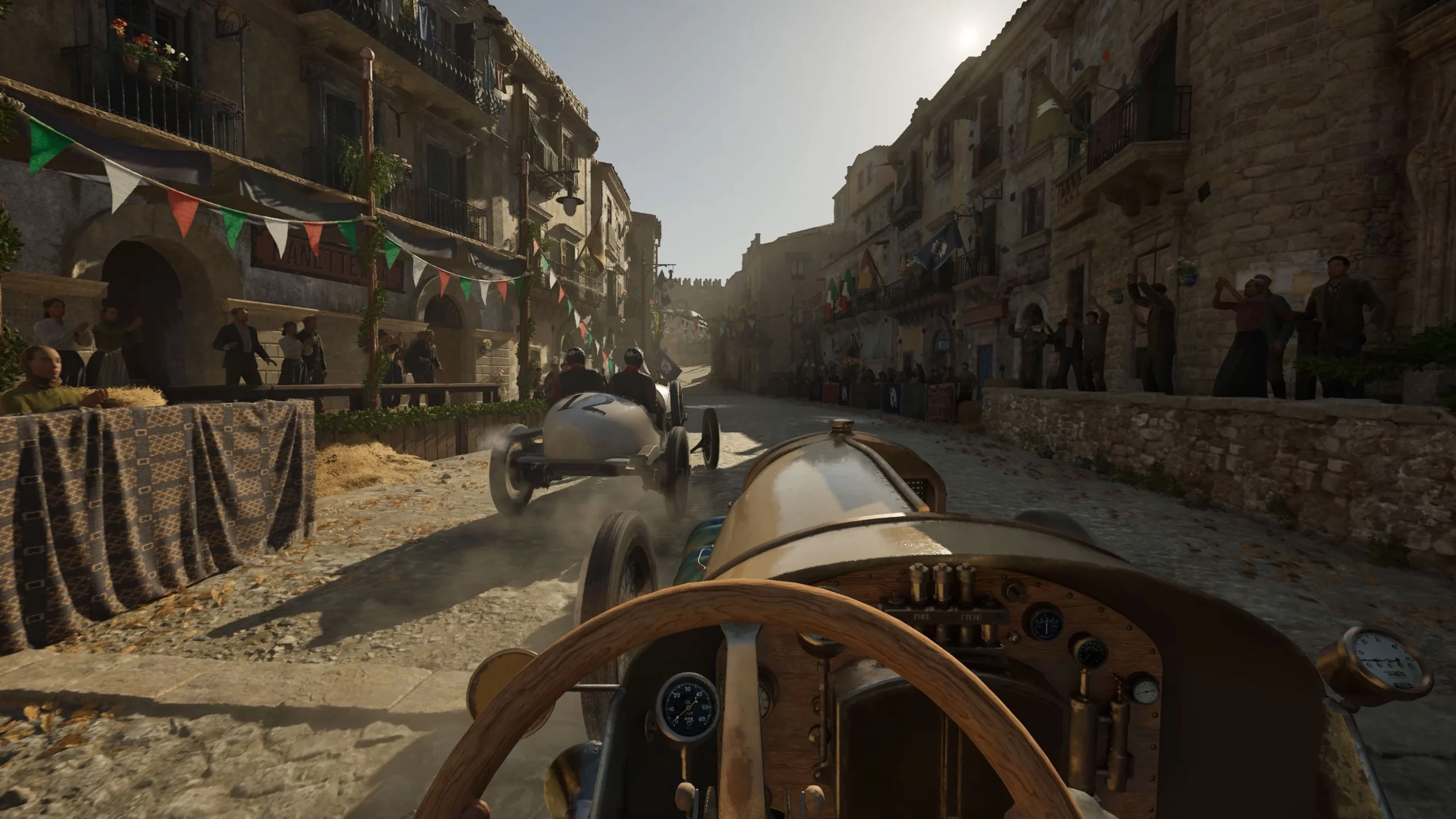 Vintage cars race through a sunlit Sicilian street, showcasing Mafia: The Old Country's Free Ride update