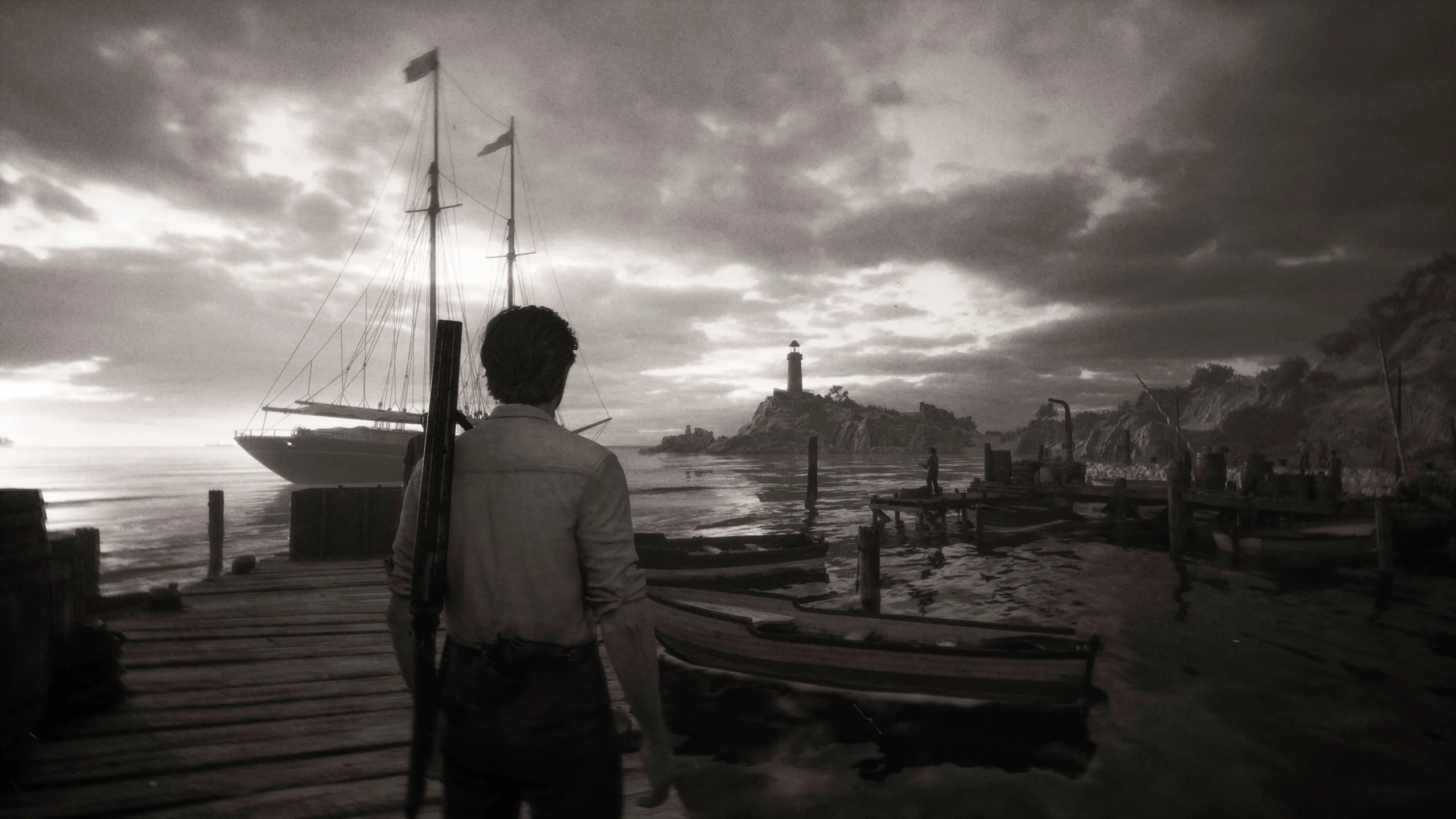 A lone figure stands on a dock, gazing at a lighthouse and sailboat under a dramatic, cloudy sky