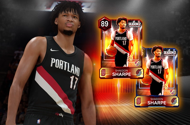 Basketball player in Portland jersey with two NBA 2K26 MyTEAM cards featuring Shaedon Sharpe