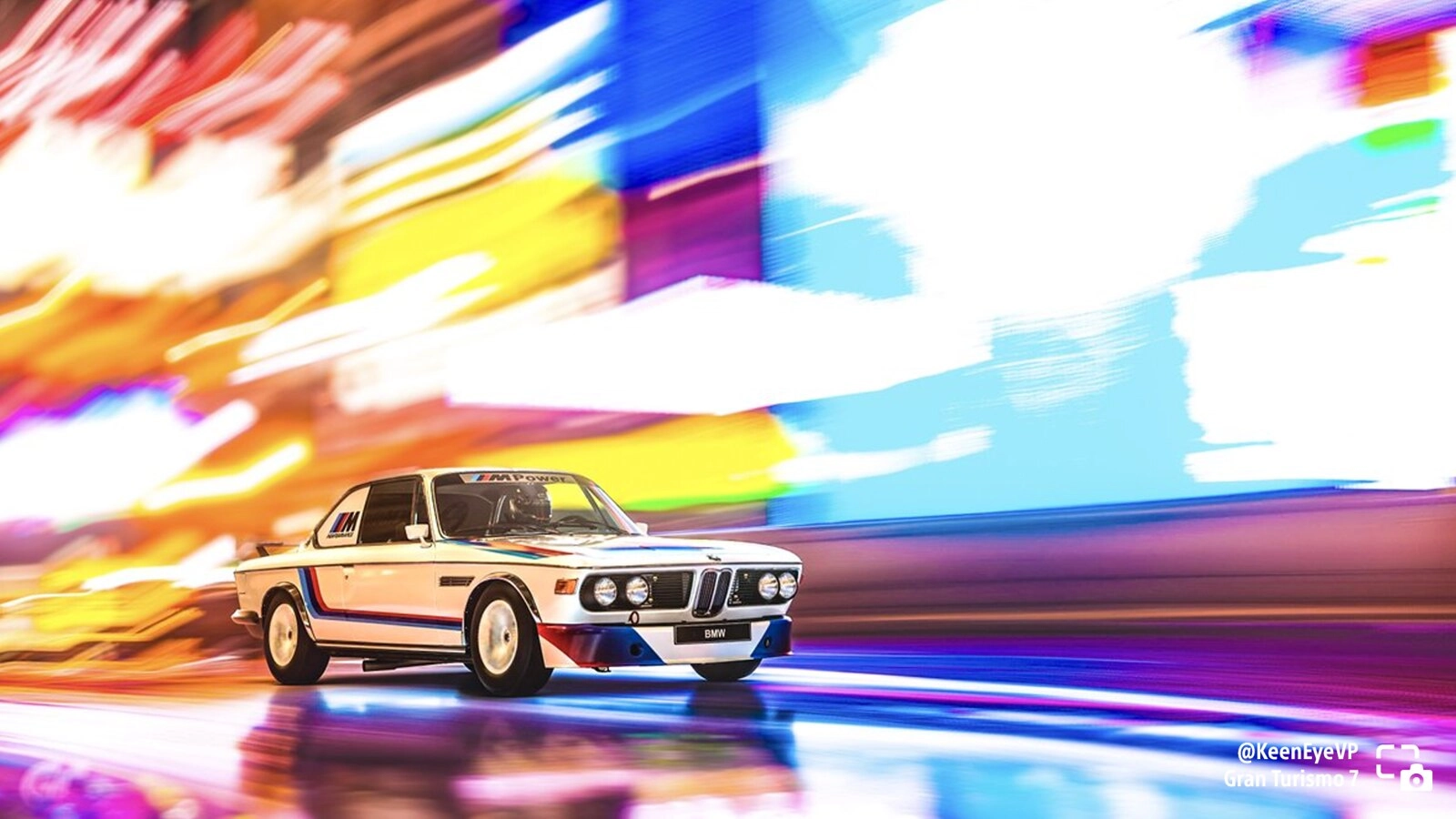BMW racing through vibrant, colorful street blur in Gran Turismo 7, showcasing speed and motion
