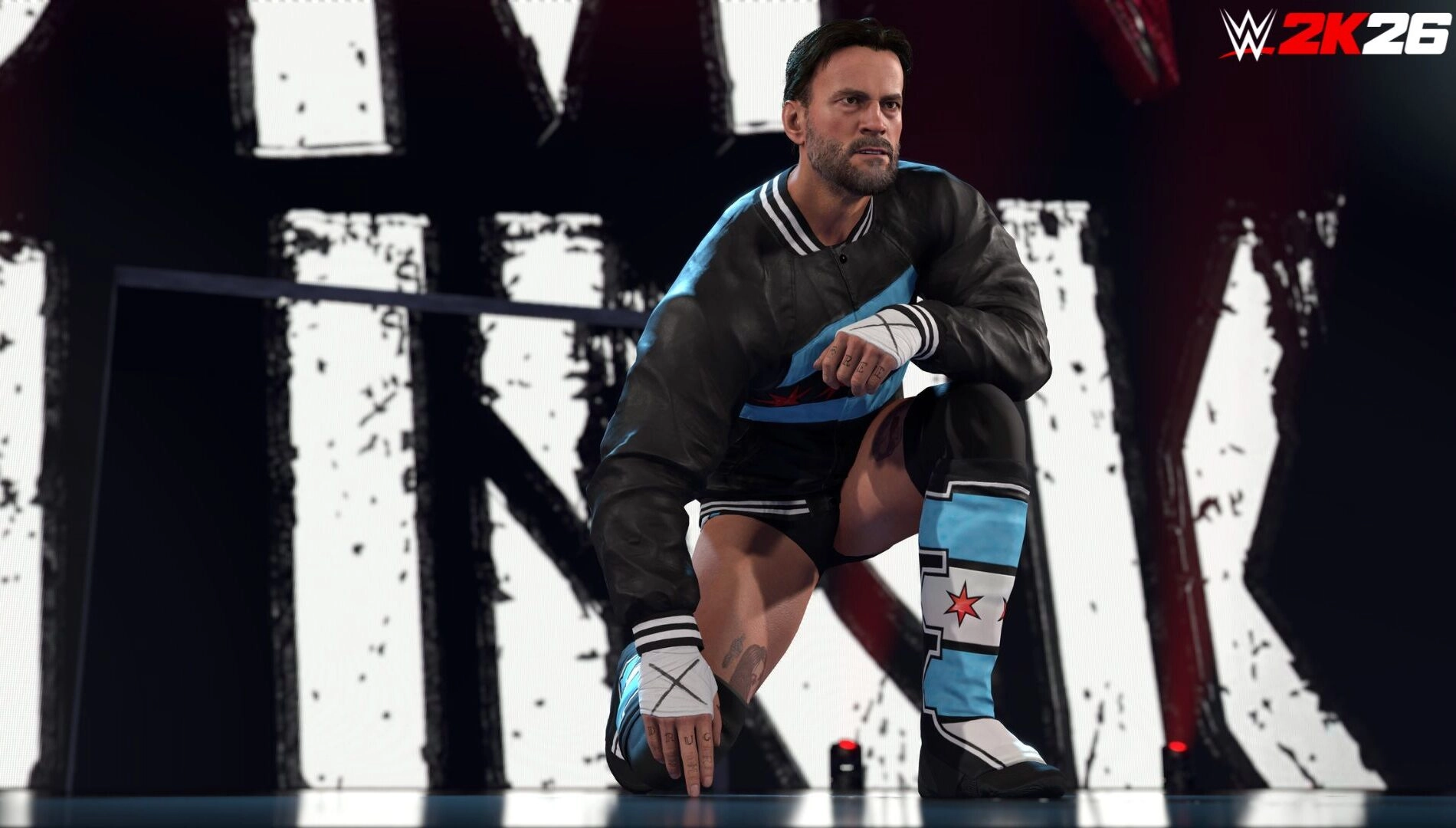 CM Punk kneeling in the WWE 2K26 game, wearing a jacket and wrestling gear, with the logo in the background