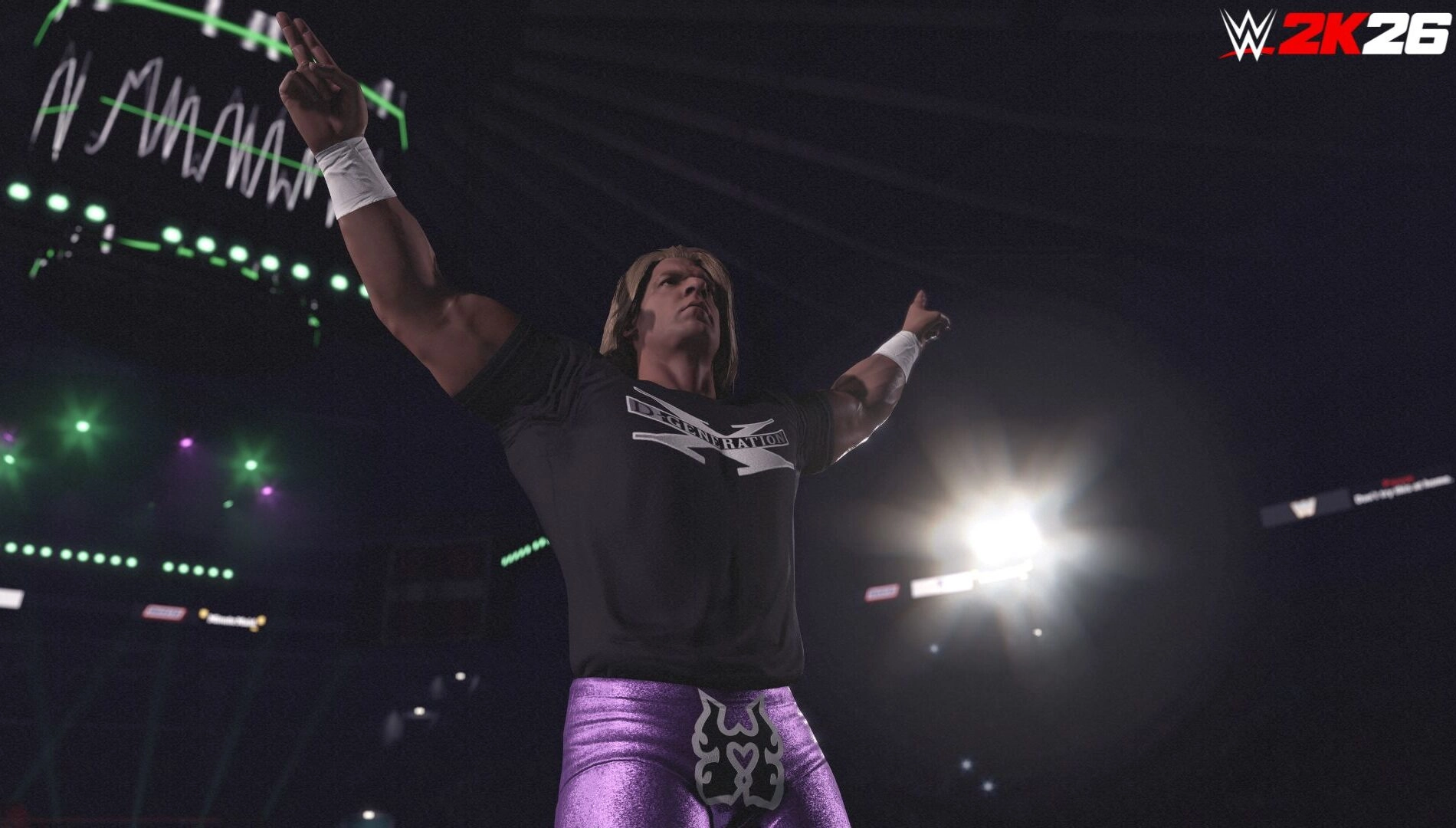Wrestler in purple pants and black shirt poses triumphantly in WWE 2K26 arena with bright lights