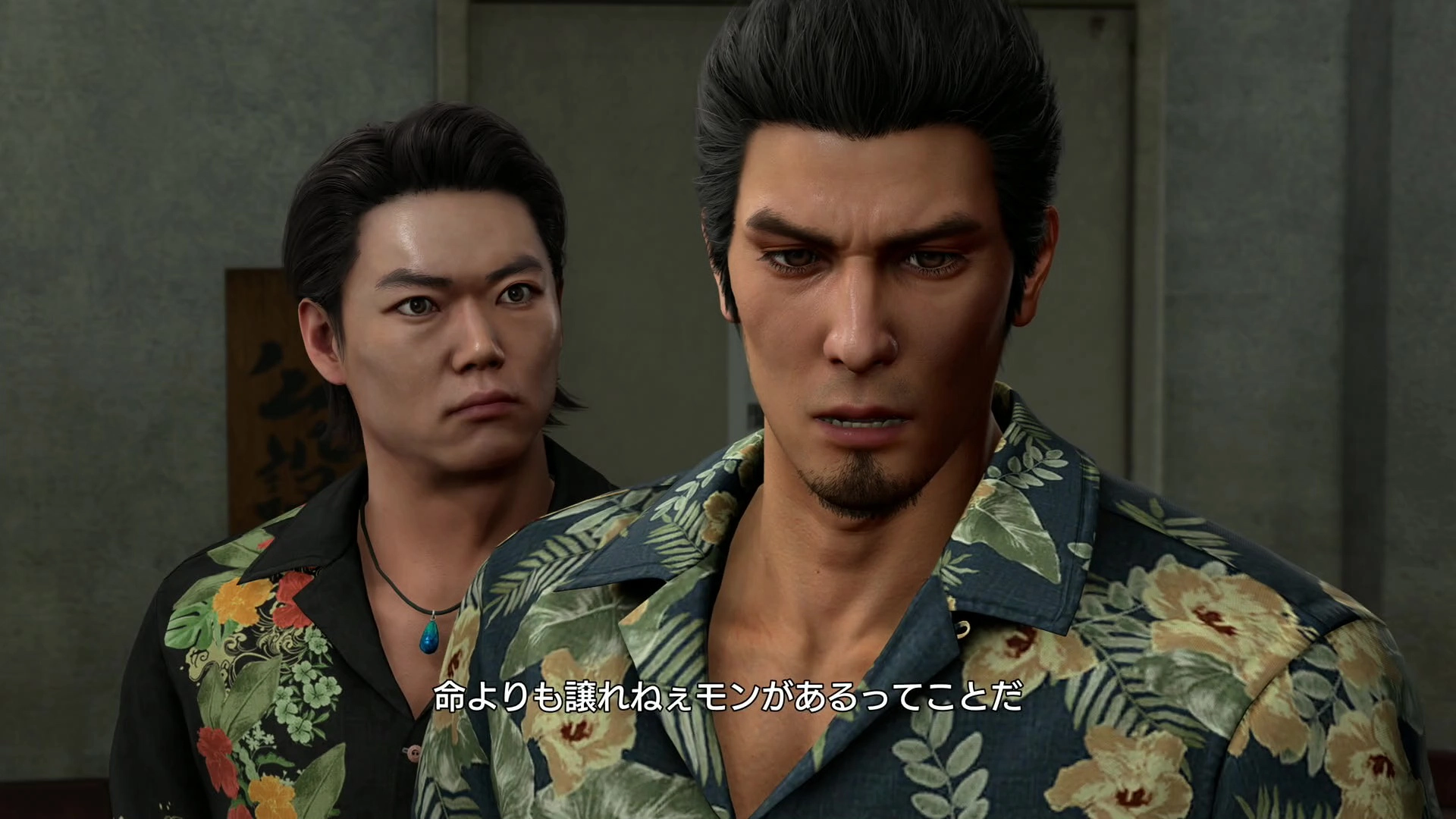 Two men in floral shirts appear tense, possibly in a dramatic scene from Yakuza Kiwami 3