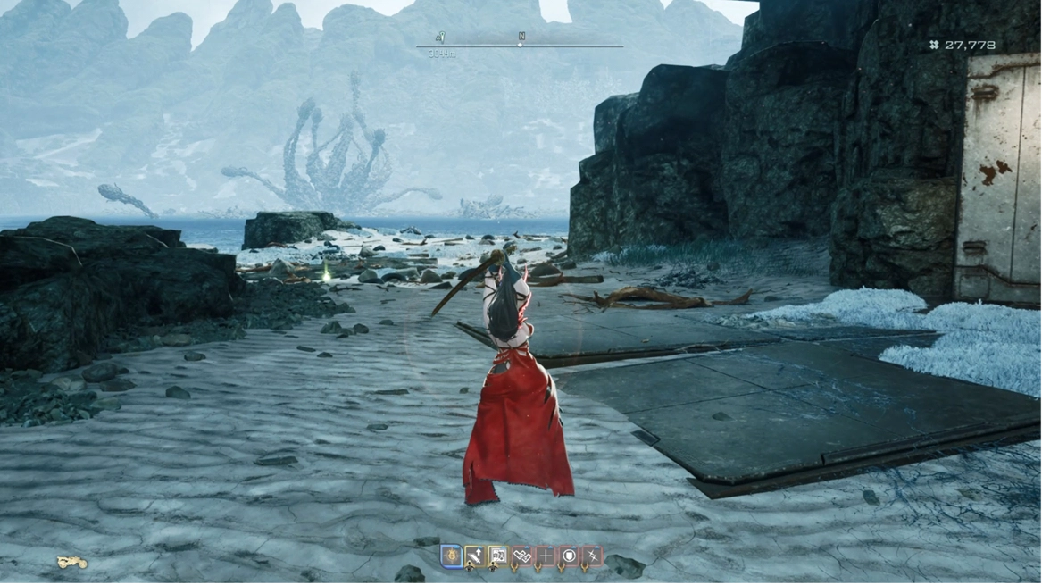 A character in a red outfit explores a beach with rocky cliffs, enhancing gameplay immersion in Code Vein II