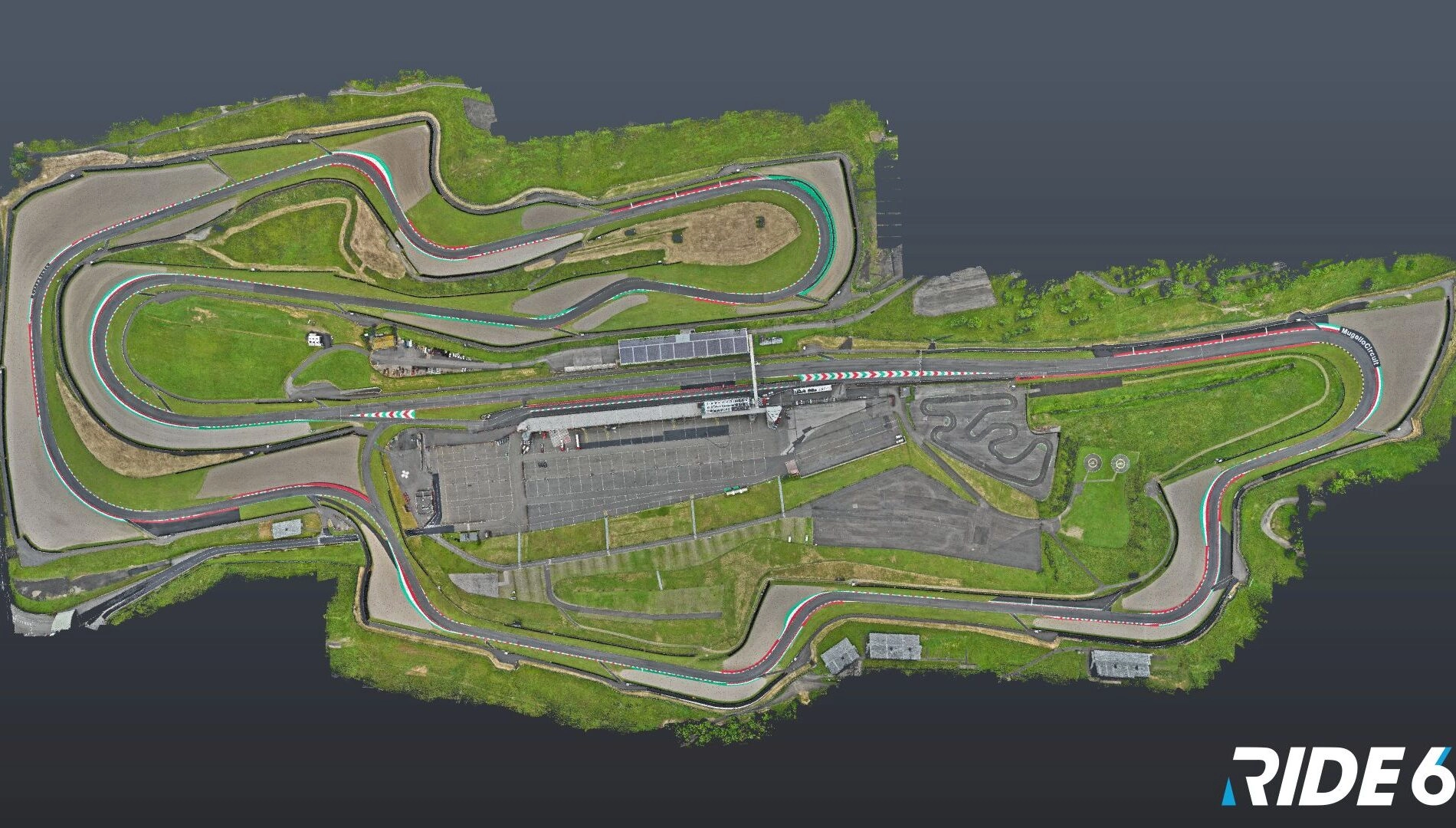 Aerial view of a detailed race track map in Ride 6, showcasing intricate turns and vibrant track colors