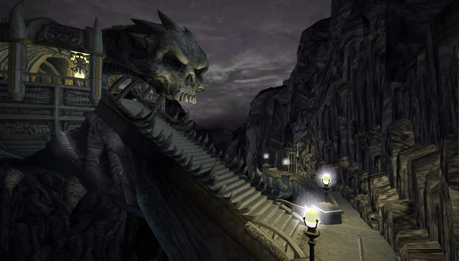 Dark fantasy landscape with a giant stone skull, winding staircase, and eerie lighting in Legacy of Kain game