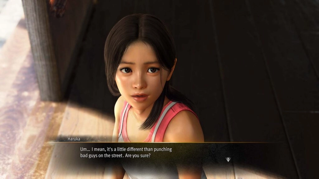 Young girl in a pink tank top looking up, speaking with a concerned expression in a wooden room