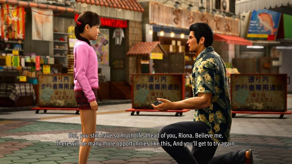 Kiryu kneels, speaking to a young girl in a vibrant market setting, conveying a heartfelt moment