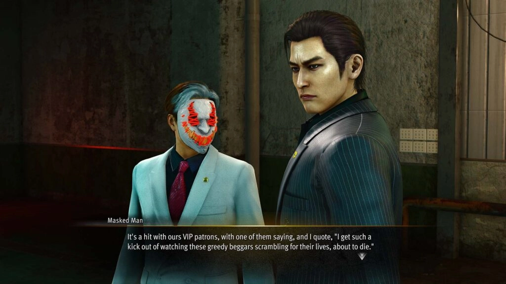 A serious man in a suit stands beside a masked figure in a dimly lit room, discussing intense matters