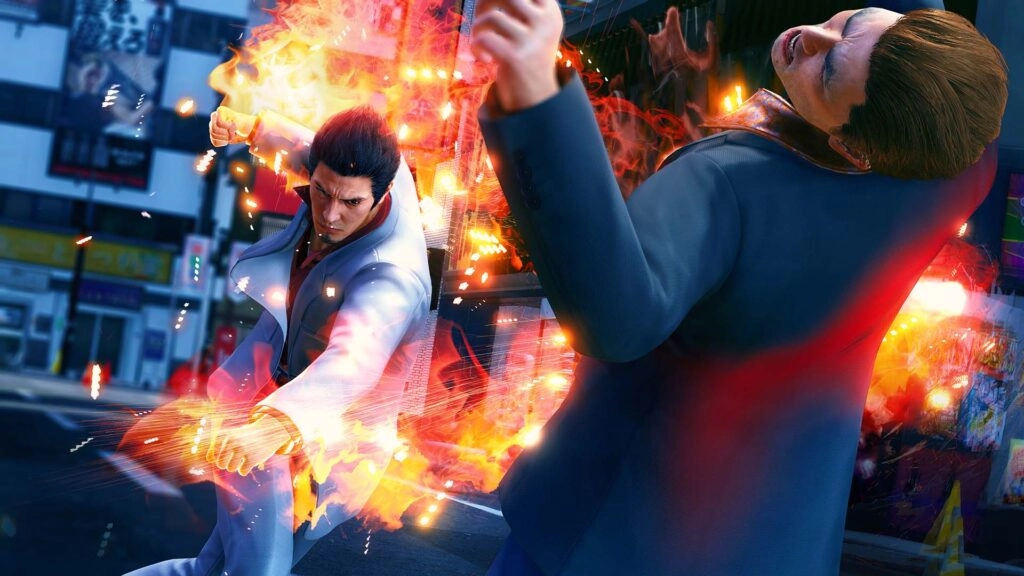 Kiryu unleashes a fiery punch on an opponent in a dynamic street battle scene from Yakuza Kiwami 3 remake