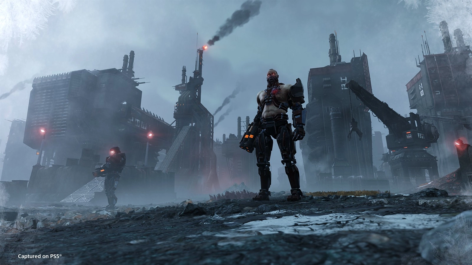 Cyborgs stand in a dystopian factory cityscape, preparing to defend against the Helldivers' assault